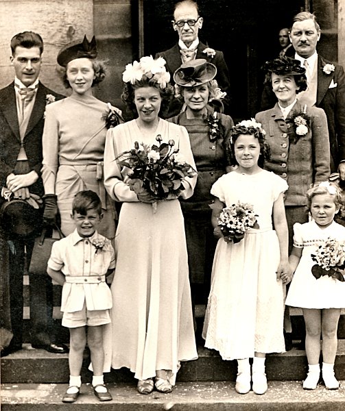dadandmomwedding5-1946.png - The wedding party: from left to right:front row: Munro Swan, Phyllis Swan, unknown bridesmaidsmiddle row: Robert Runciman,Jr., his wife Pat, Mrs Runciman, Mrs Macgregor-Brown - Mother of the brideback row: Robert Runciman Sr., and Ian Swan. 